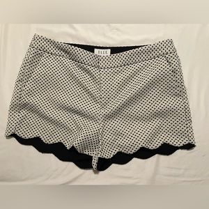 Elle white shorts with black threaded dots in size 14